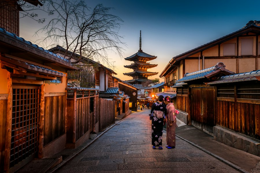 Two women in kimono on a street in Kyoto